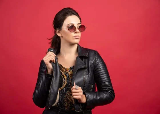 Image of A Woman in Leather Jacket and Sunglasses